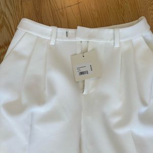 Never worn with tags. Favorite daughter white trousers. Size 2!